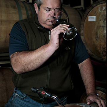 winemaker testing wine