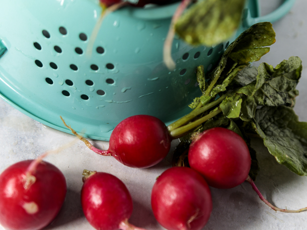 radishes and colander